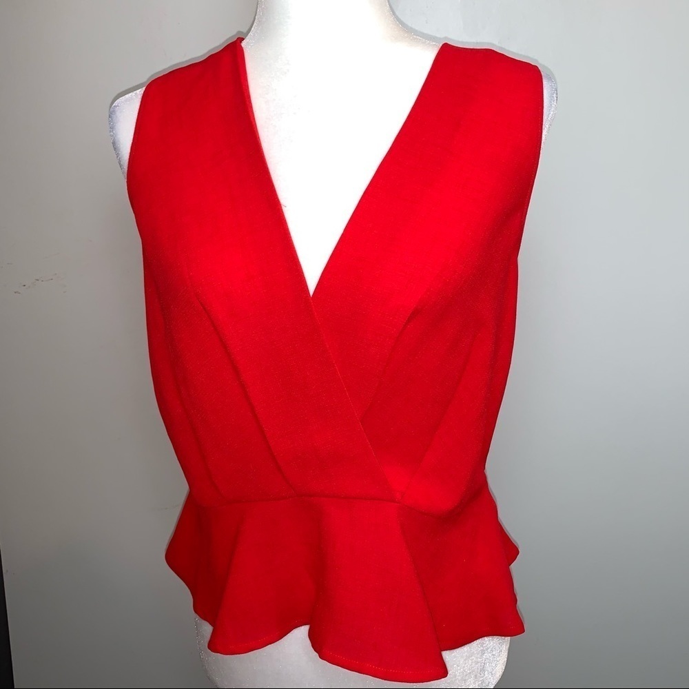 Elodie Sleeveless Peplum Top